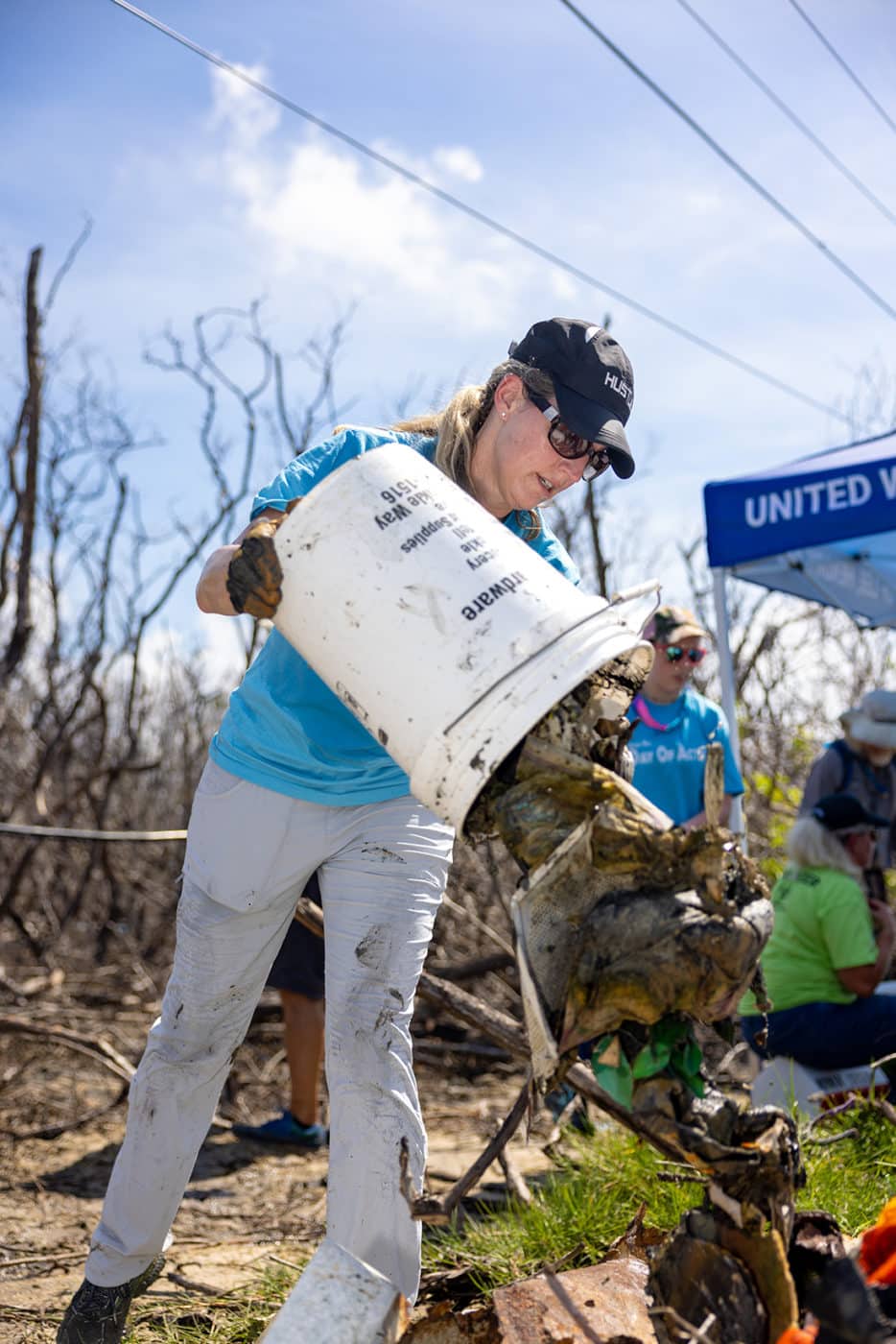 person dumping out trash