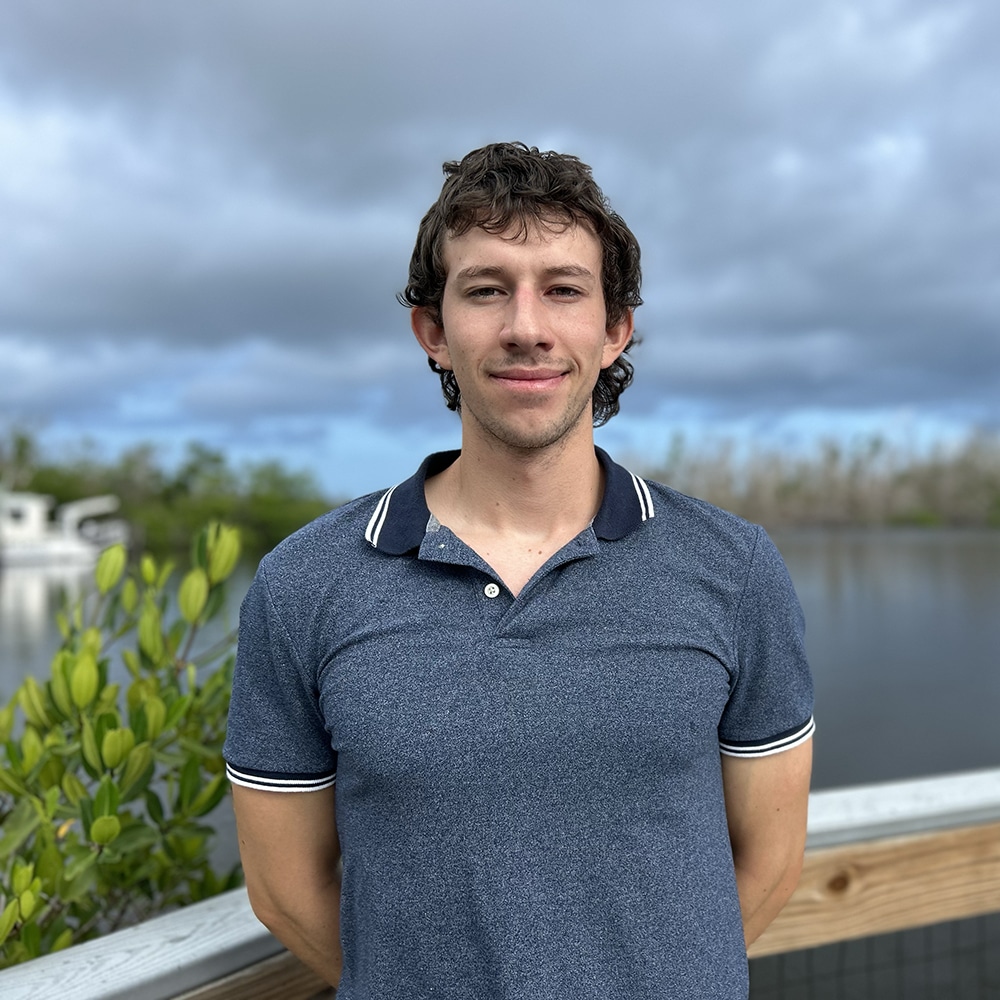 man smiling outdoors