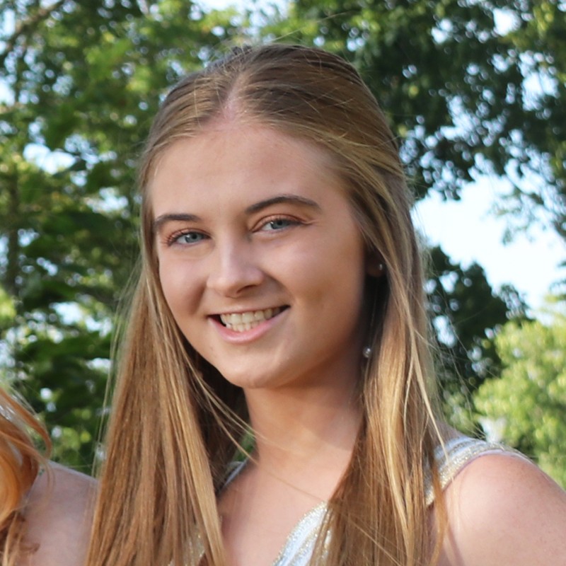 woman smiling outdoors