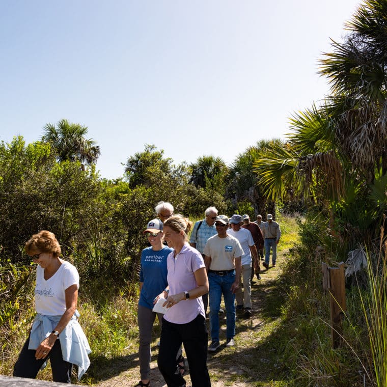 people hiking in nature education field trip