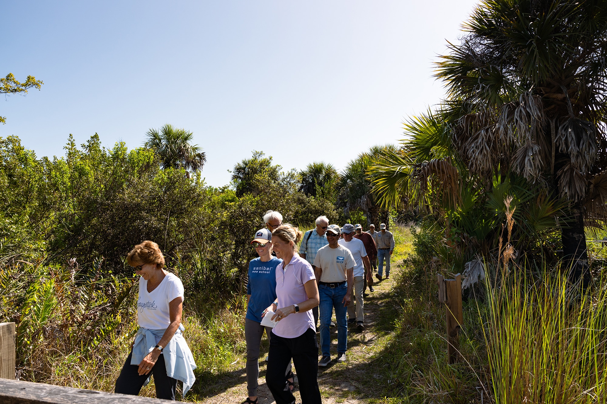 people hiking in nature education field trip