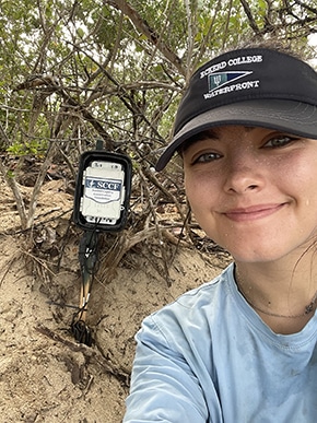 woman smiling outdoors