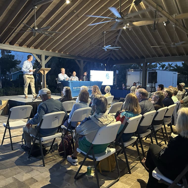 everglades update outdoors, room of people watching panel on stage