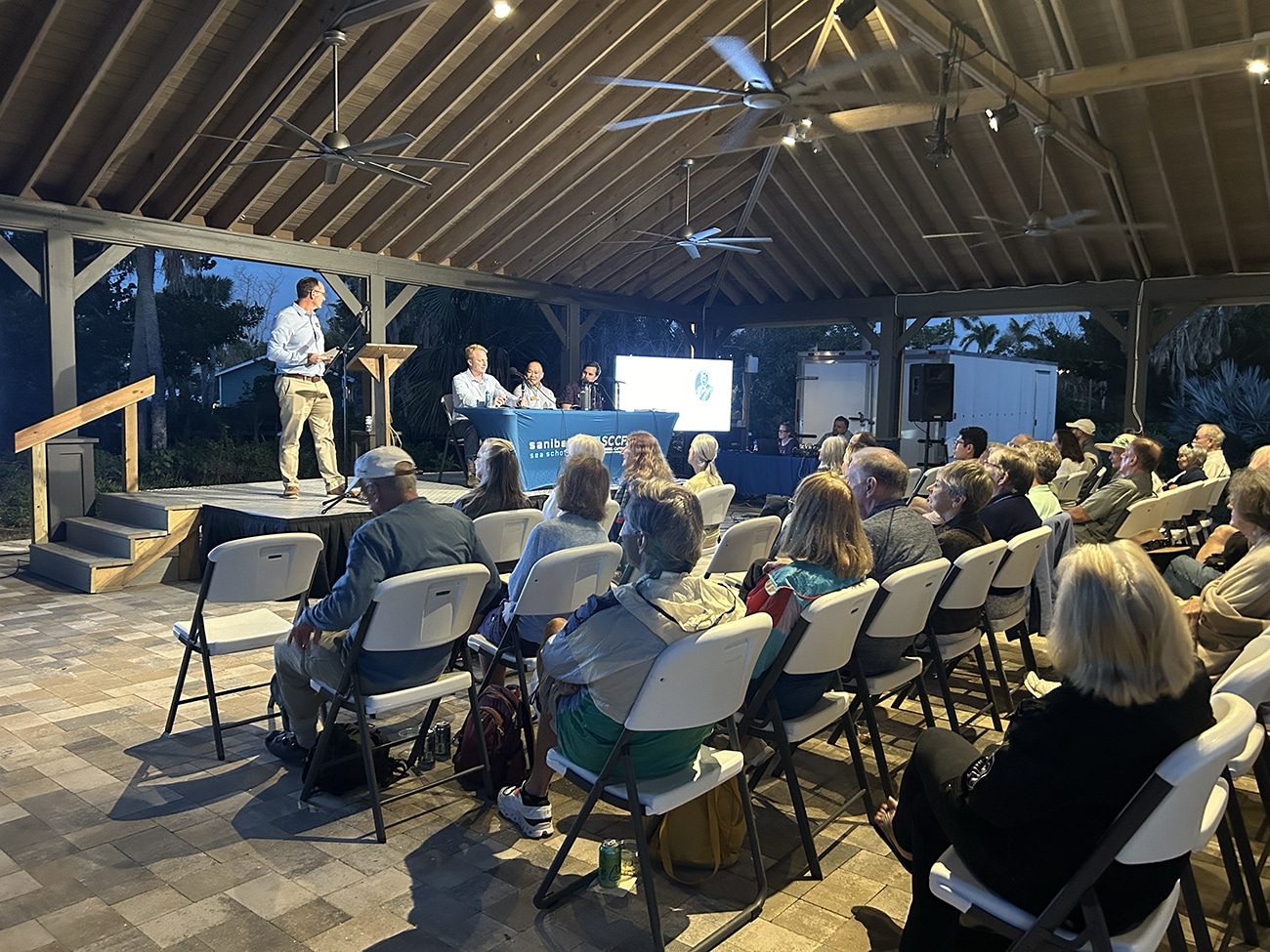 everglades update outdoors, room of people watching panel on stage