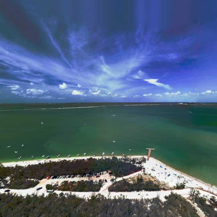 aerial of water over sanibel with causeway visible in back