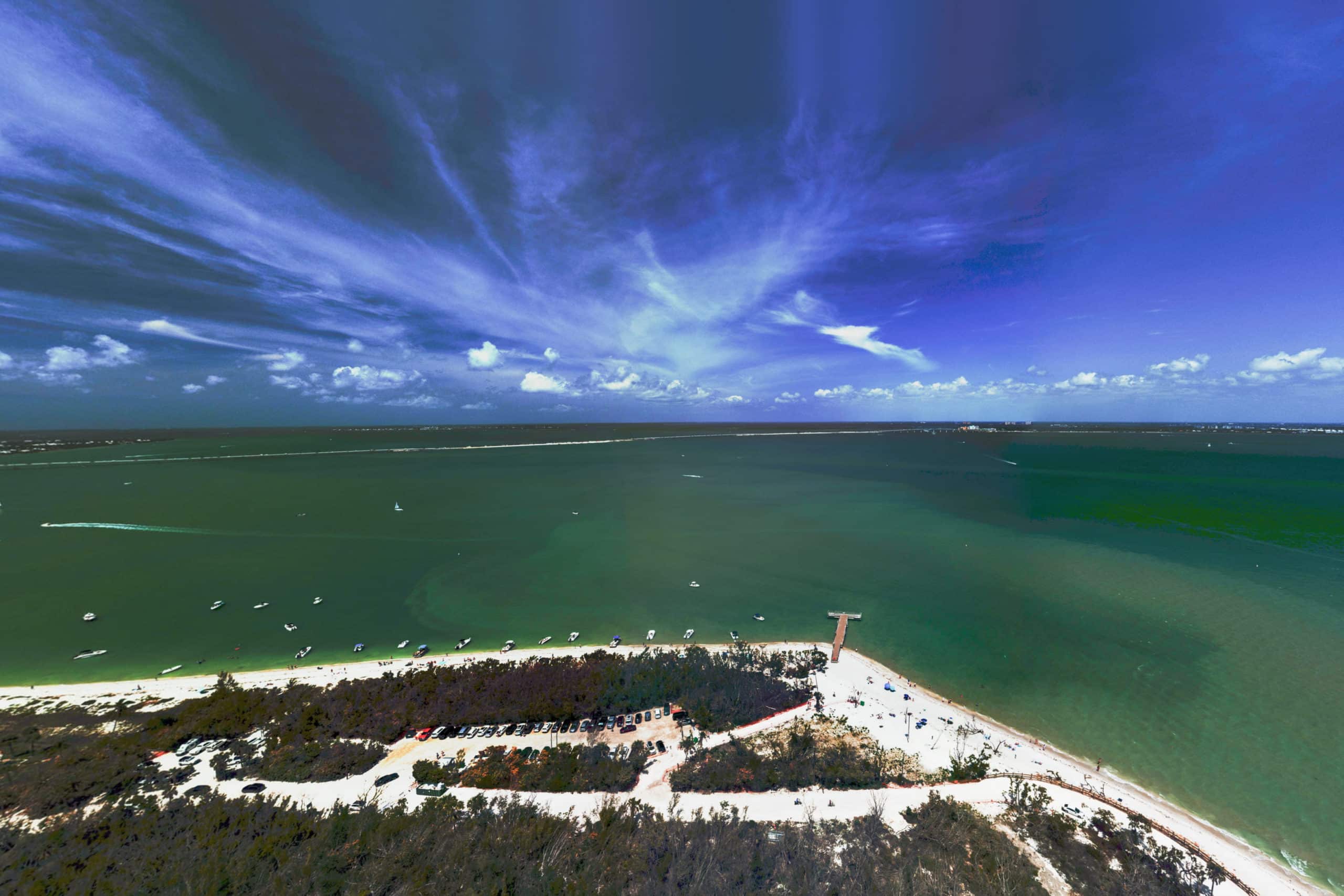 aerial of water over sanibel with causeway visible in back