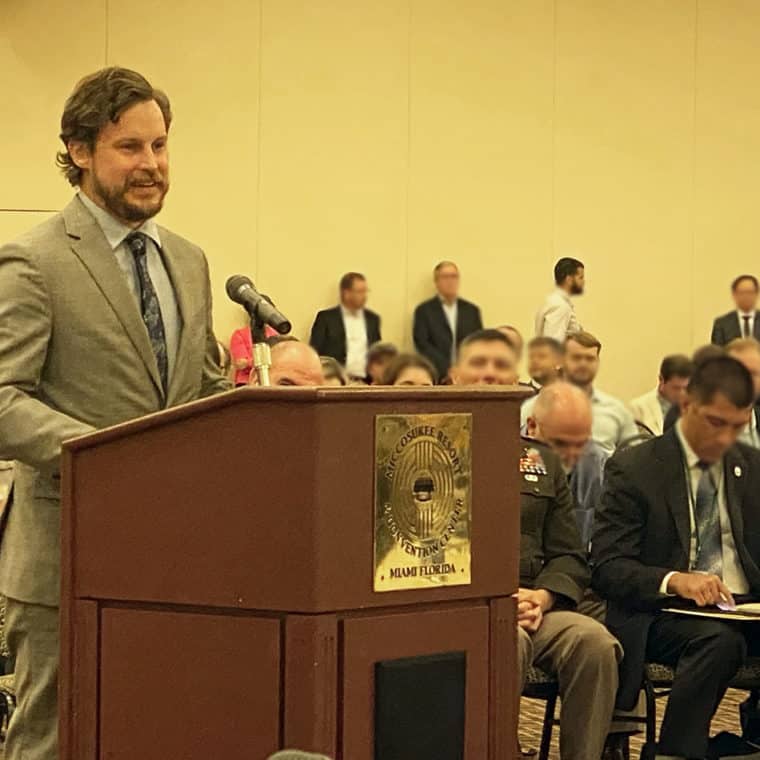 person speaking in meeting