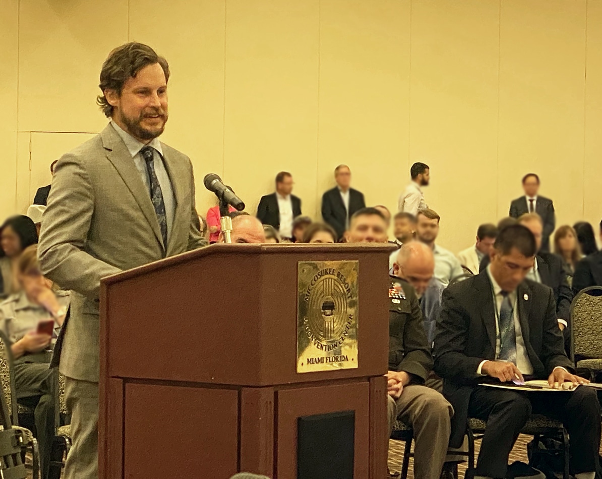 person speaking in meeting