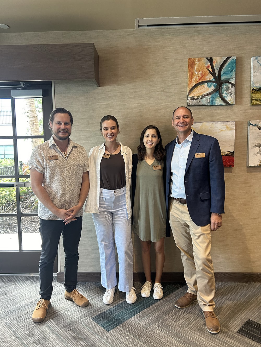 image of four people indoors