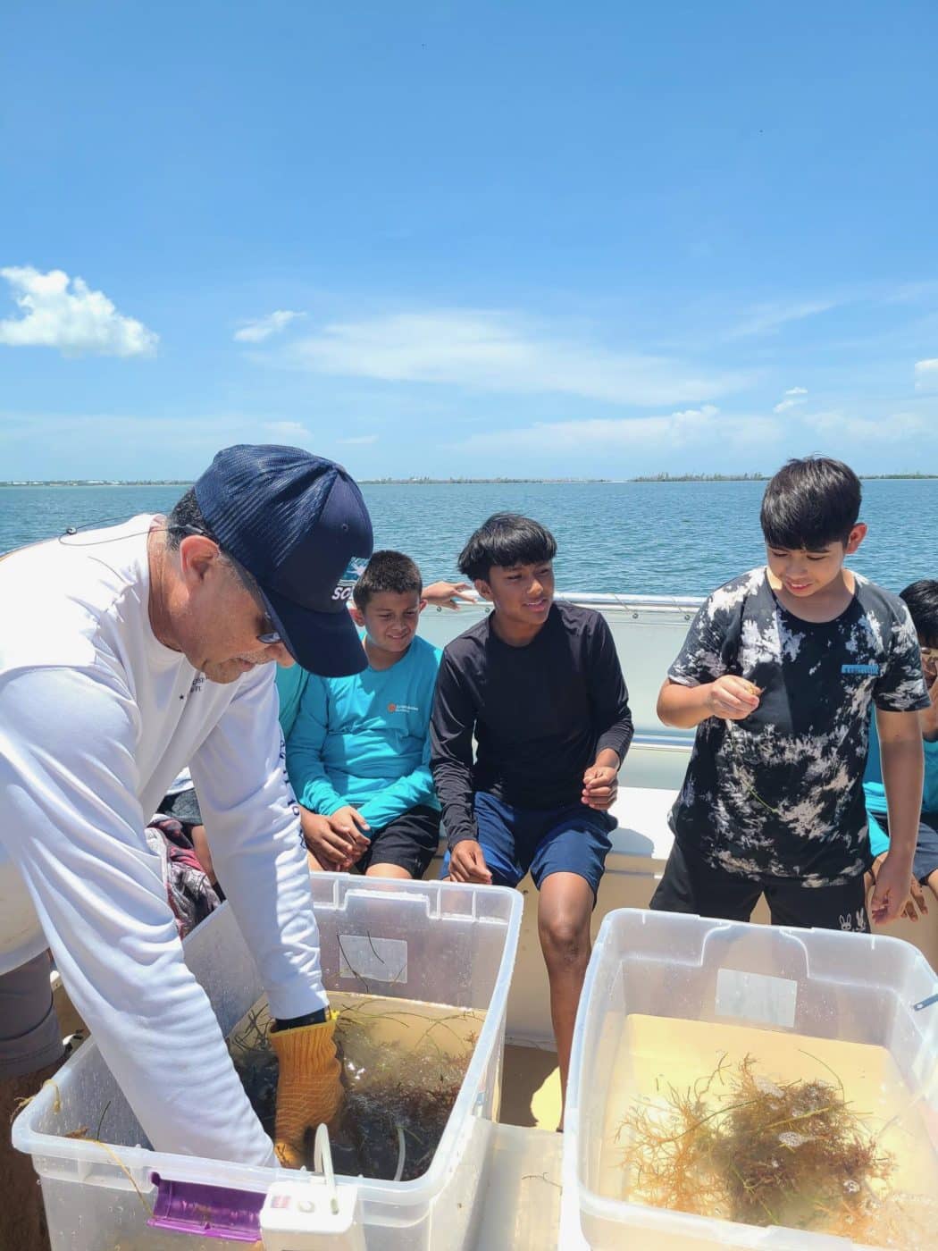 kids looking at sea life