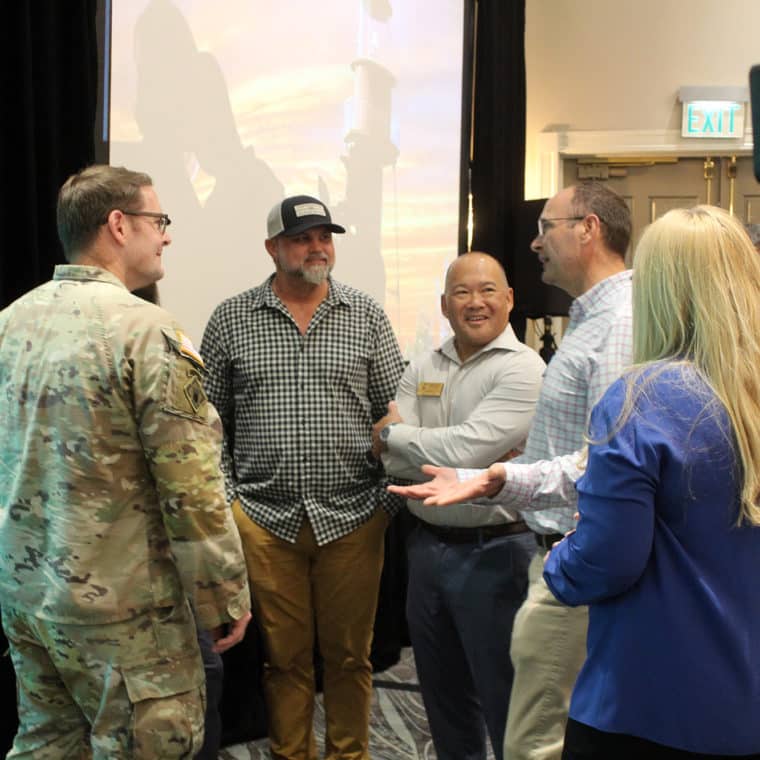 people chatting with colonel