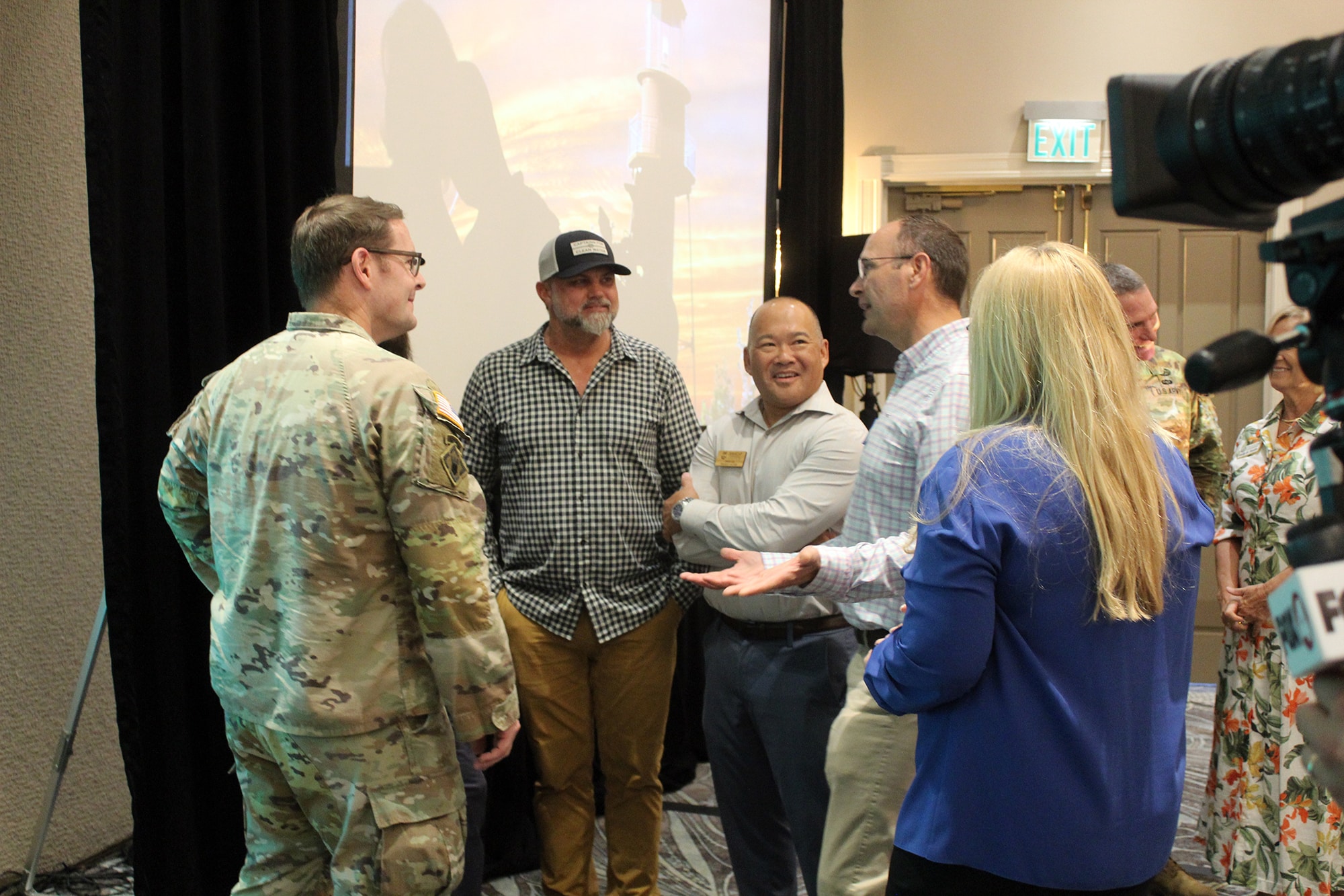 people chatting with colonel