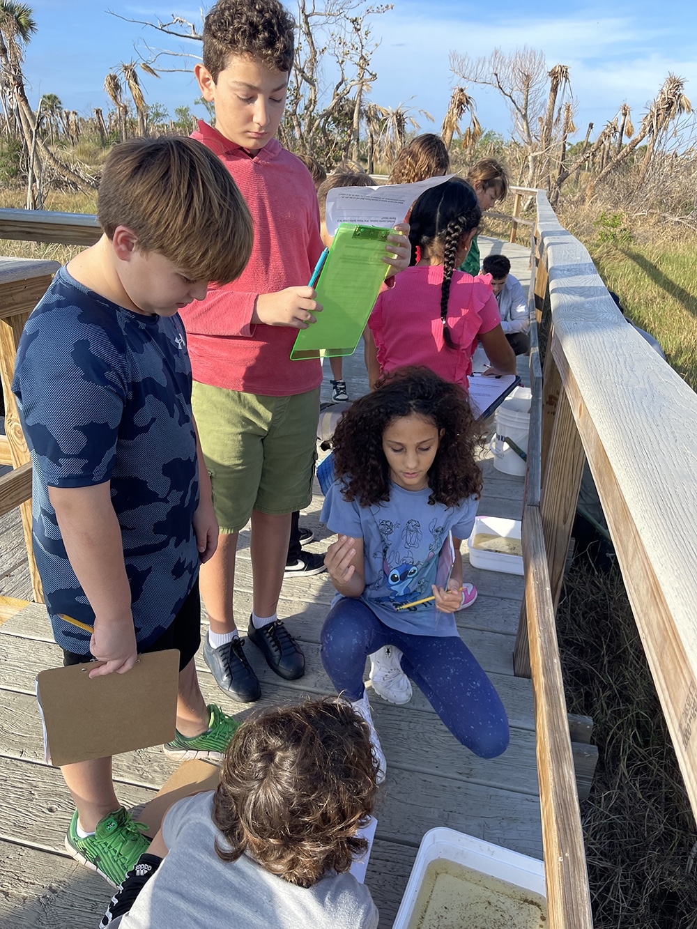 students learning outdoors