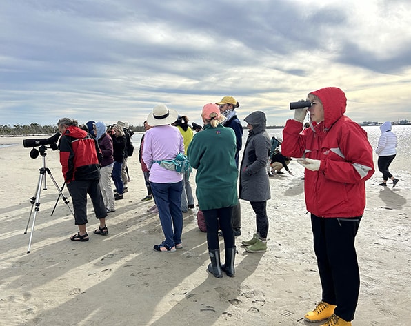 people exploring Bunche beach outdoors